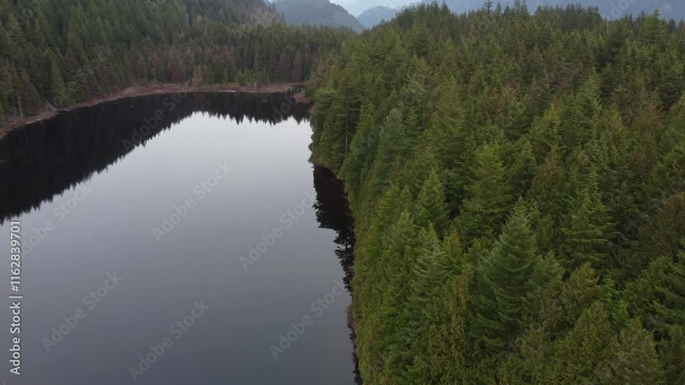 custom made wallpaper toronto digitalFloating through nature’s calm: a lake and rolling green hills under clouds