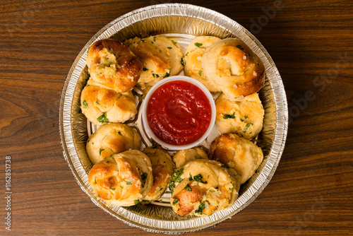 Canvas Print Garlic knots with marinara sauce