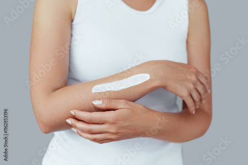 Wallpaper Mural Closeup of female hands applying hand cream.Hand Skin Care.  Women use body lotion on your arms.  Beauty And Body Care Concept Torontodigital.ca