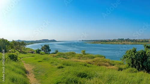 Wallpaper Mural Serene Nile River Landscape Grassy Banks, Blue Waters, Distant Hills Torontodigital.ca
