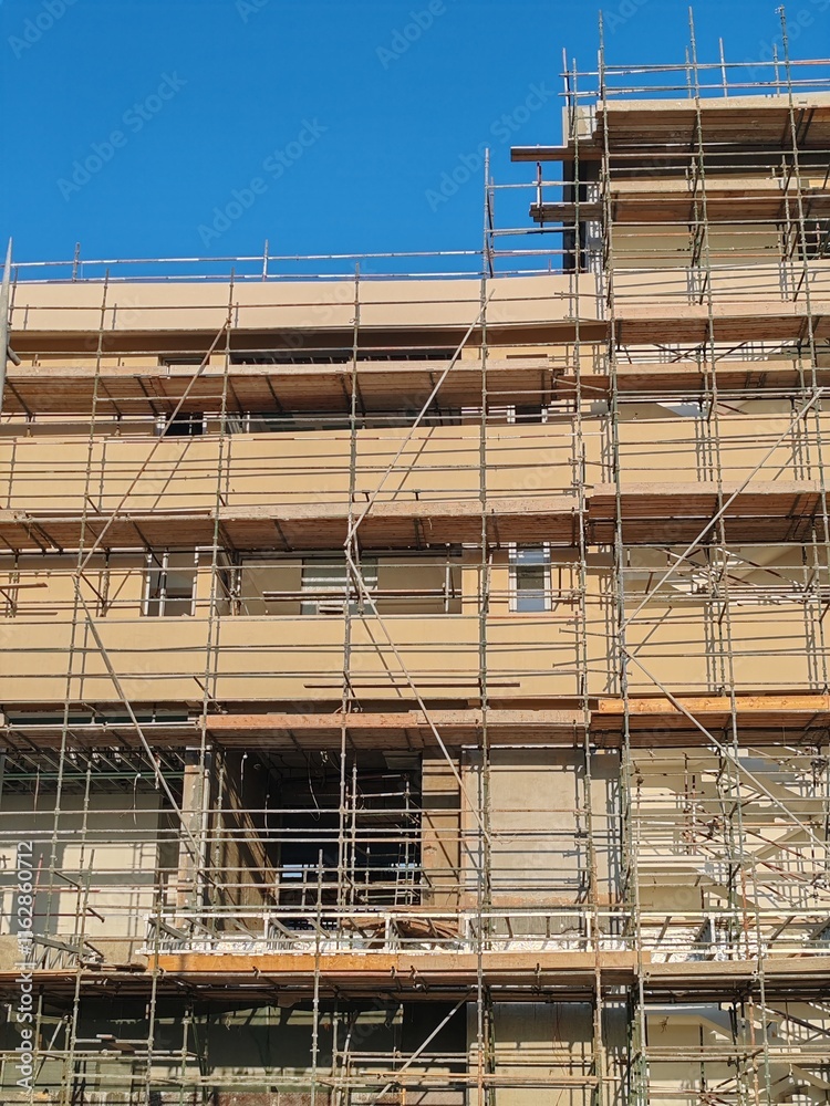 Scaffolding Erected Around Under Construction Building.
Safety Scaffolding Protection Covered The Front Of Under Construction Skyline
03 Floor Residential Under Construction Tower Structure Scaffolding Erected Around Under Construction Building.
Safety Scaffolding Protection Covered The Front Of Under Construction Skyline
03 Floor Residential Under Construction Tower Structure