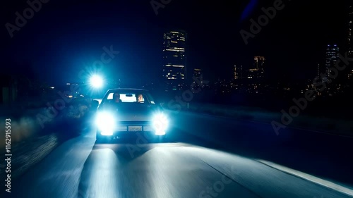 Car Driving at Night in City