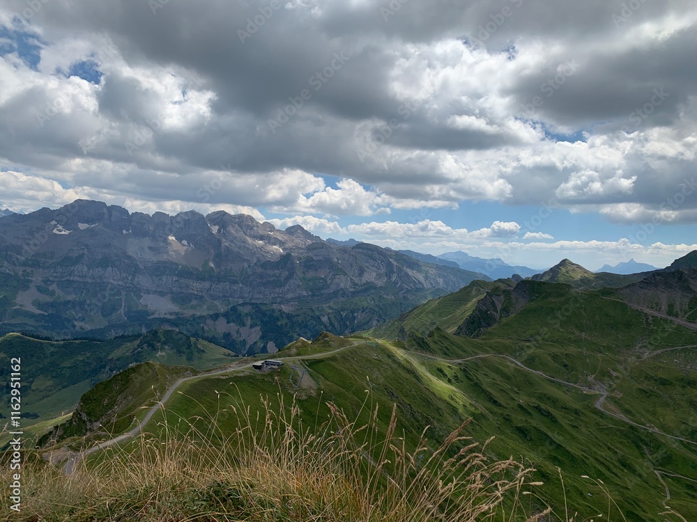 Naklejka premium landscape with clouds and mountain