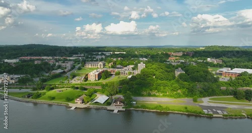 Poughkeepsie, NY, USA - 06-29-2022:  Summer afternoon aerial drone video of the east side of the Hudson River, Poughkeepsie, NY.	