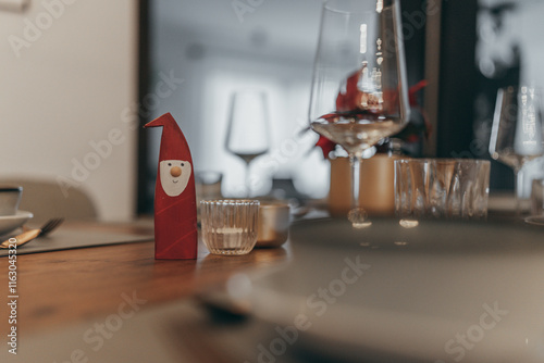 Wooden Santa Claus on a Festive Christmas Table