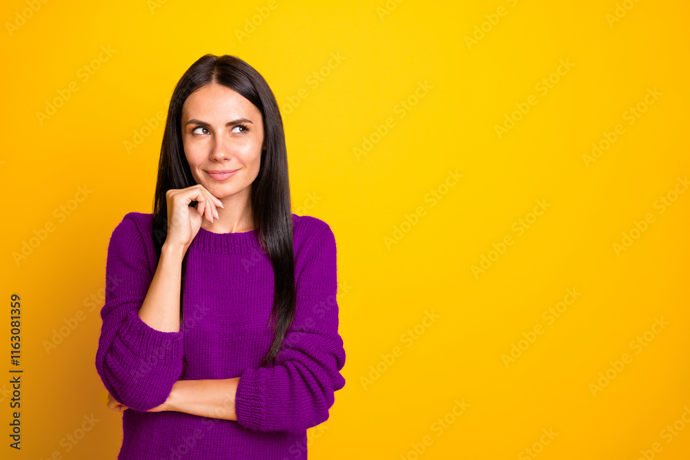 Portrait of minded girl think look at copyspace wear red jumper isolated over yellow background Portrait of minded girl think look at copyspace wear red jumper isolated over yellow background