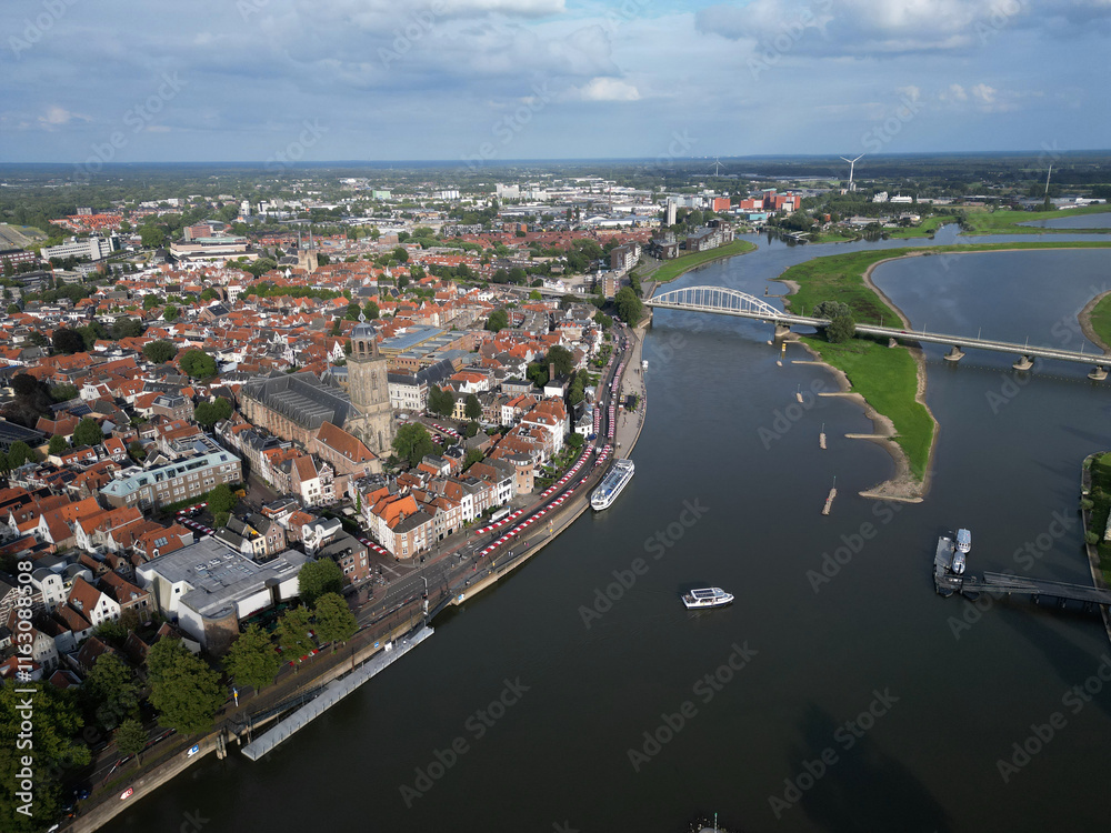 Fototapeta premium Aerial view of the Ijssel river and the city of Deventer, The Netherlands