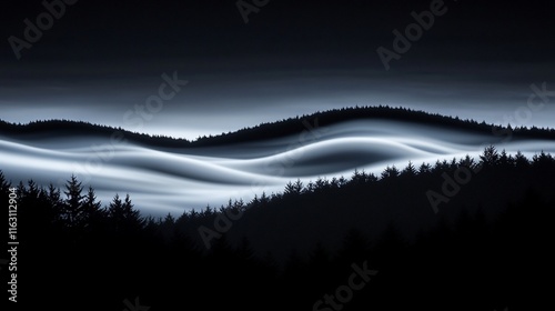 Night landscape, dark hills, flowing clouds, monochrome.