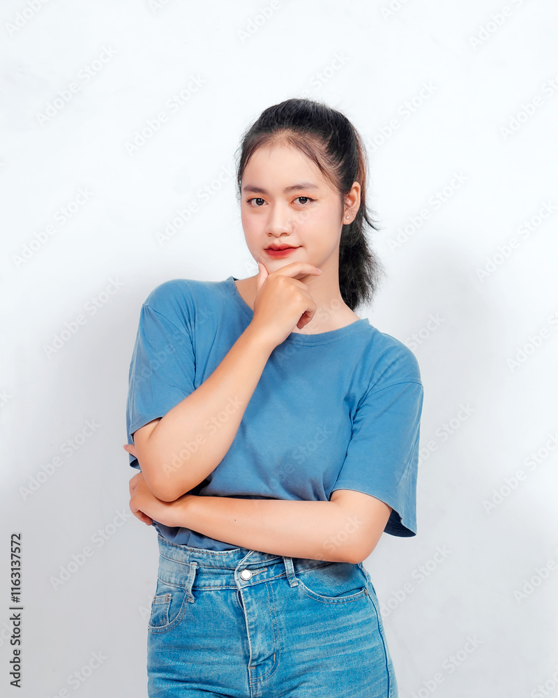 Asian woman showing thinking gesture with his eyes isolated on white