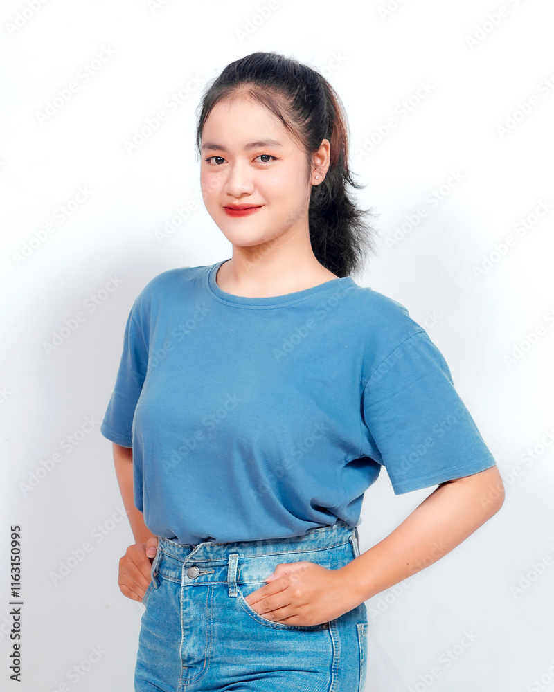 Portrait of a confident smiling girl standing on white background Portrait of a confident smiling girl standing on white background