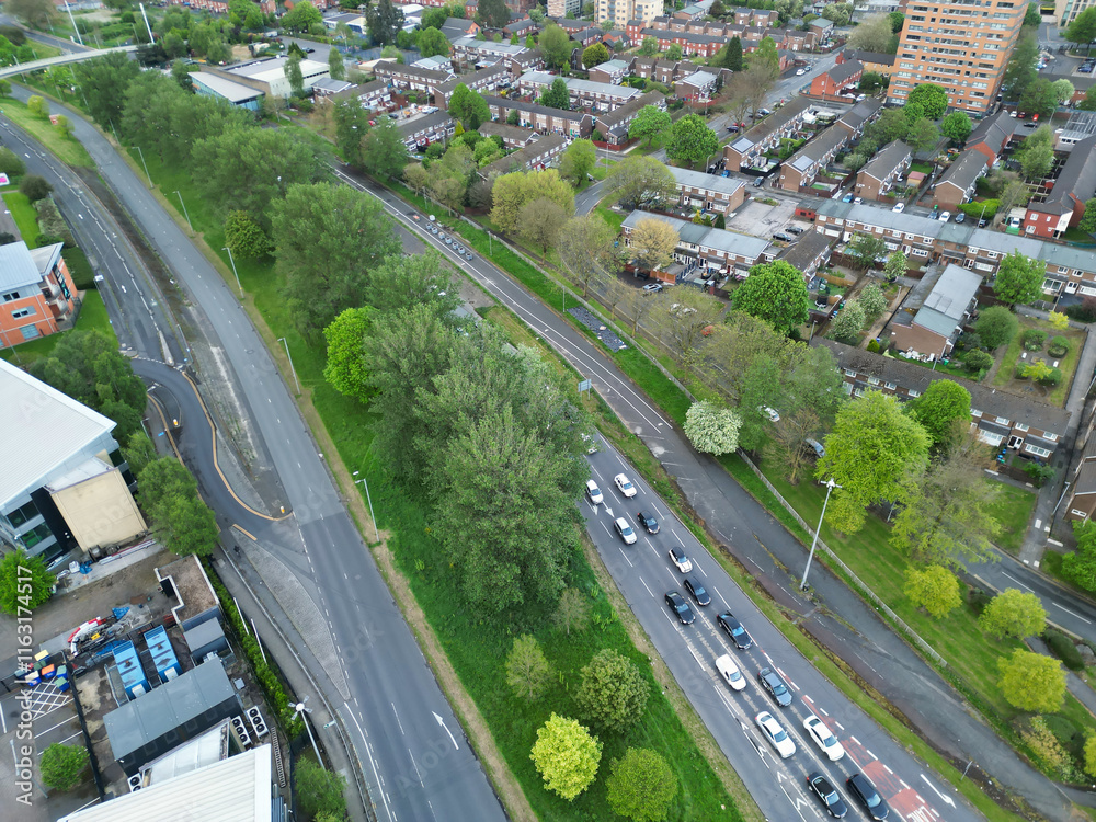 Aerial View of Buildings at Greater Manchester Central City, Northwest of England, United Kingdom. Aerial View Footage Was Captured with Drone's Camera on May 4th, 2024 During Sunset Time.