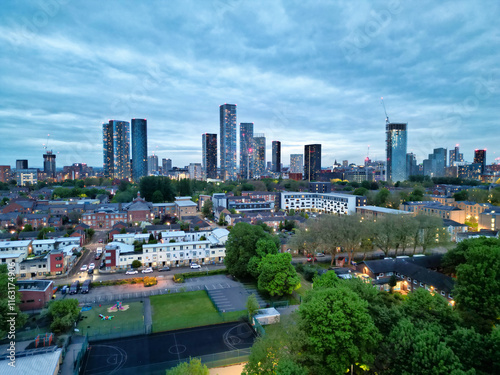 Aerial View of Buildings at Greater Manchester Central City, Northwest of England, United Kingdom. Aerial View Footage Was Captured with Drone's Camera on May 4th, 2024 During Sunset Time.