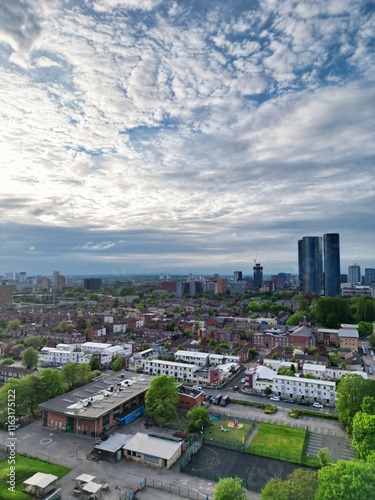 Aerial View of Buildings at Greater Manchester Central City, Northwest of England, United Kingdom. Aerial View Footage Was Captured with Drone's Camera on May 4th, 2024 During Sunset Time.