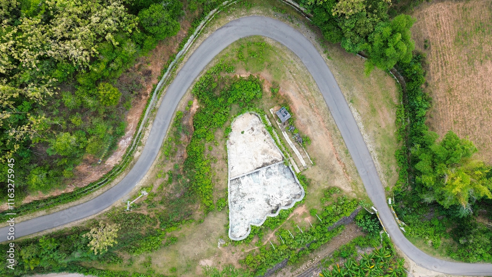 Aerial view of rural road in the forest. Top view. Aerial view of rural road in the forest. Top view.