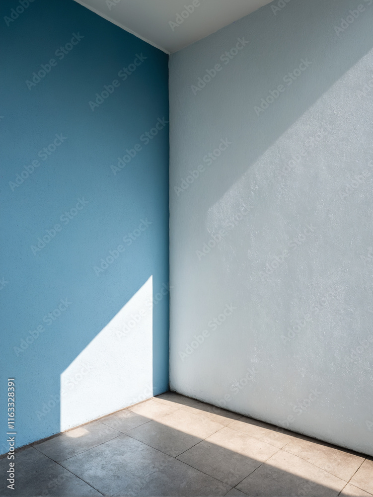 Obraz premium sunlight on blue wall. Beautiful light background