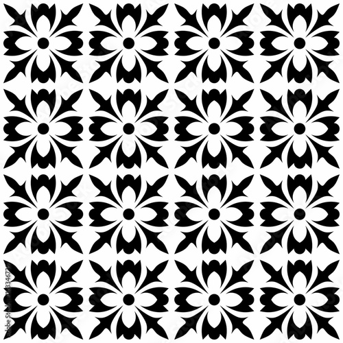 Seamless black and white geometric pattern, featuring a symmetrical design with floral motifs. Suitable for backgrounds, wallpapers, textiles, fabrics and various creative projects.