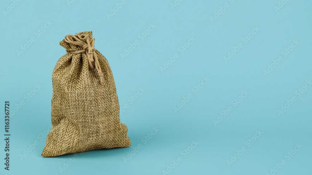 Coins pouch as illustration of tax Coins pouch as illustration of tax