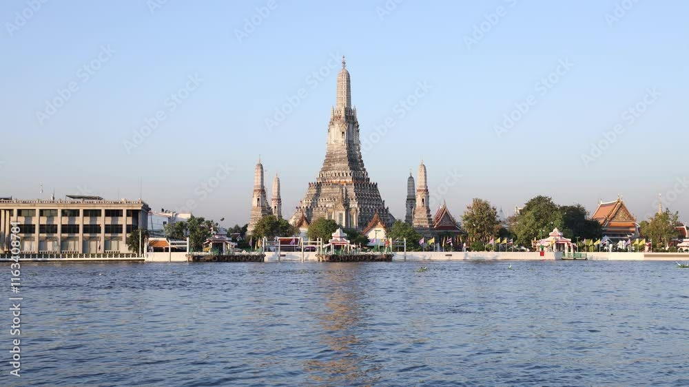 Wat Arun Ratchawararam in morning(Temple of Dawn) famous tourist destination in Bangkok, Thailand.time lapse. Wat Arun Ratchawararam in morning(Temple of Dawn) famous tourist destination in Bangkok, Thailand.time lapse.