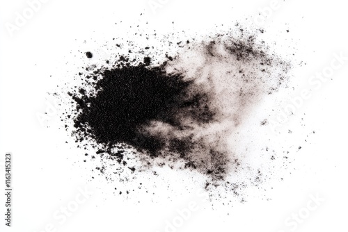 Dark powder scattered on white background
