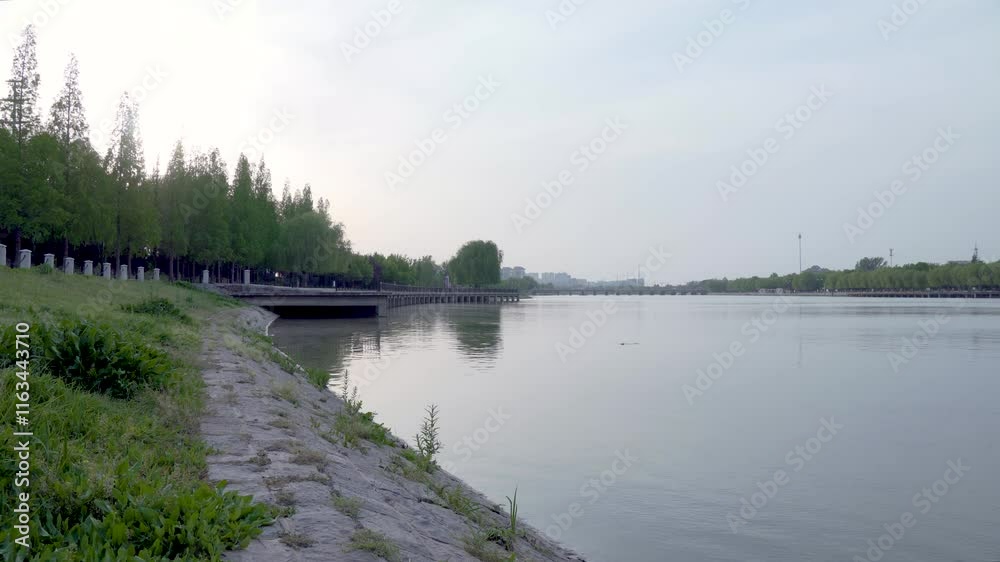 Natural river airspace live show featuring tranquil vistas and serene waters at dusk Natural river airspace live show featuring tranquil vistas and serene waters at dusk