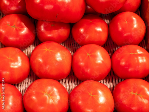 red tomatoes on a white background