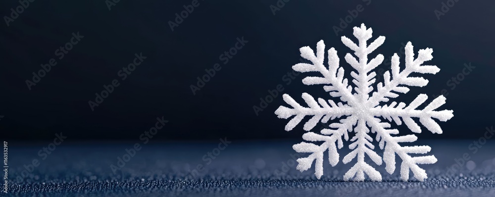 Snowflake abstract background idea. A detailed snowflake resting on a dark surface, showcasing its unique crystals and shapes. Snowflake abstract background idea. A detailed snowflake resting on a dark surface, showcasing its unique crystals and shapes.