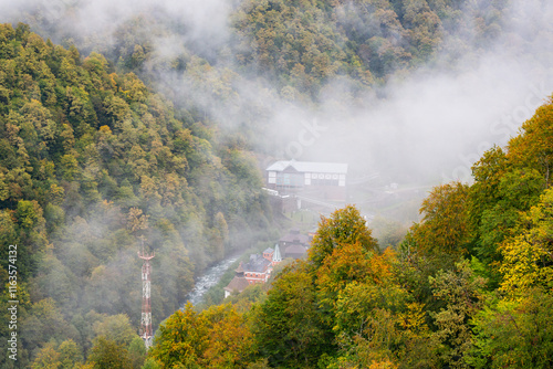 Rosa Khutor village aerial panoramic view. Rosa Khutor is an alpine ski resort located near Krasnaya Polyana town in Sochi region, Russia, autumn photo