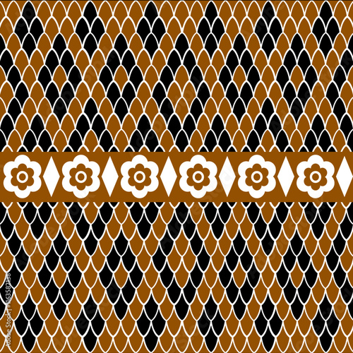 A geometric pattern featuring alternating floral and diamond shapes in brown, black, and white hues.