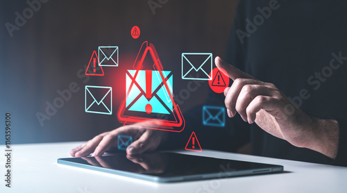 Email spam alert concept with person interacting with tablet screen.