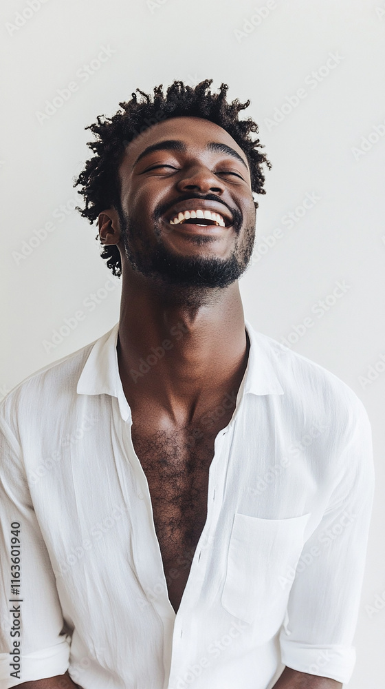 Cheerful man with a crisp white shirt and relaxed pose Cheerful man with a crisp white shirt and relaxed pose