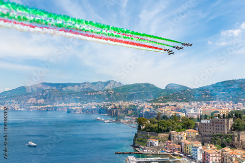 Italian Air Force's Frecce Tricolori perform in the sky of the Sorrento Coast. Sorrento. Naples. Italy photo