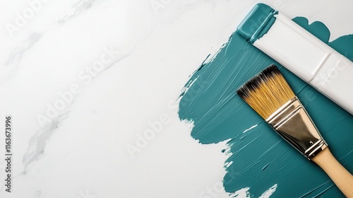 paintbrush laid on a glossy marble surface surrounded by various art supplies and equipment creating a minimalist and creative composition for design advertising or lifestyle purposes photo