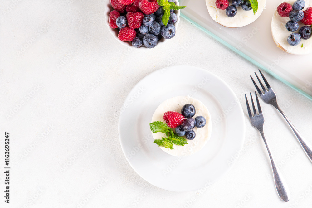 Mini vanilla New York cheesecakes Mini vanilla New York cheesecakes