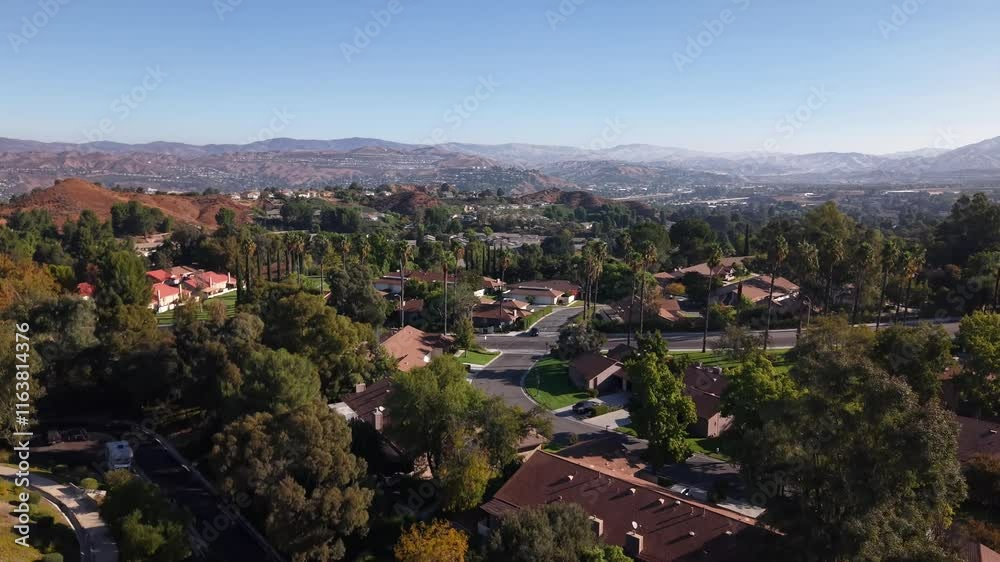 Santa Clarita, California in the morning - ascending aerial reveal of a residential neighborhood Santa Clarita, California in the morning - ascending aerial reveal of a residential neighborhood