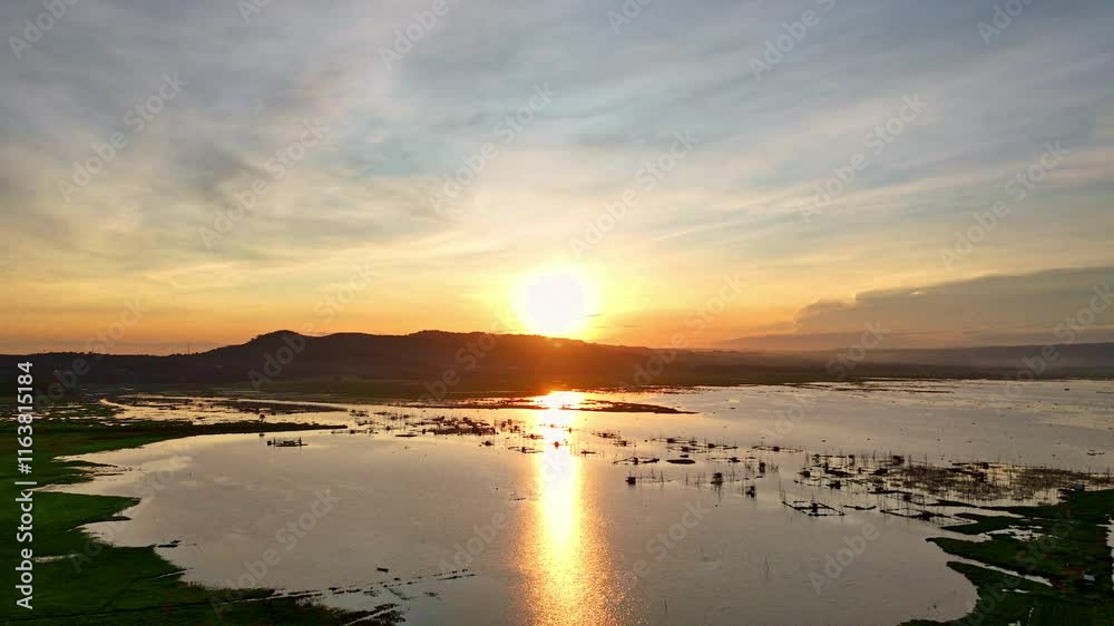 Majestic sunrise over swampland, aerial view Majestic sunrise over swampland, aerial view