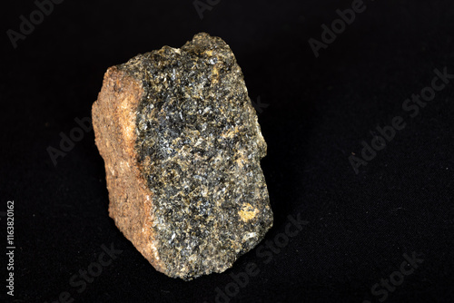 A sample of a type of peridotite called harzburgite, composed of olivine and orthopyroxene from the Bushveld Complex, South Africa. photo