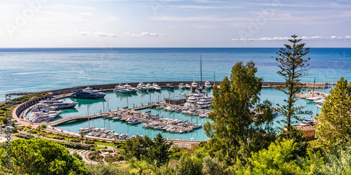 Scenic view of Ventimiglia harbour in Liguria, Italy with yachts and marina