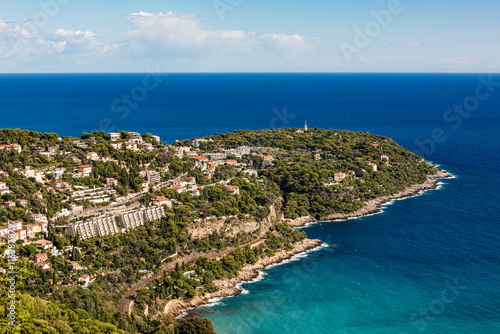 Aerial view of Cap Martin on the C�te d'Azur, France, featuring the Mediterranean coastline and residential areas. photo