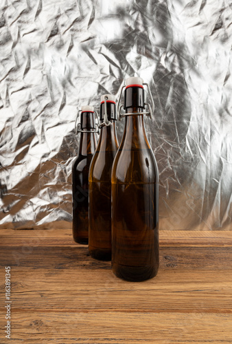 Old beer bottle, brown glass vintage beerbottle, a quality traditional time-tested drink symbol photo