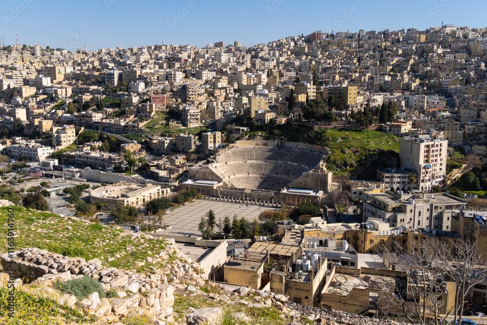 Amman, Jordan: The Roman theater is a major landmark in Amman, Jordan capital city view from the ancient citadel in the middle east on a sunny day