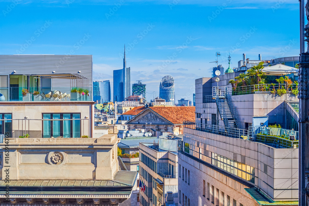 The roofs of modern shopping malls and the Milan Financial District in the background, Italy.