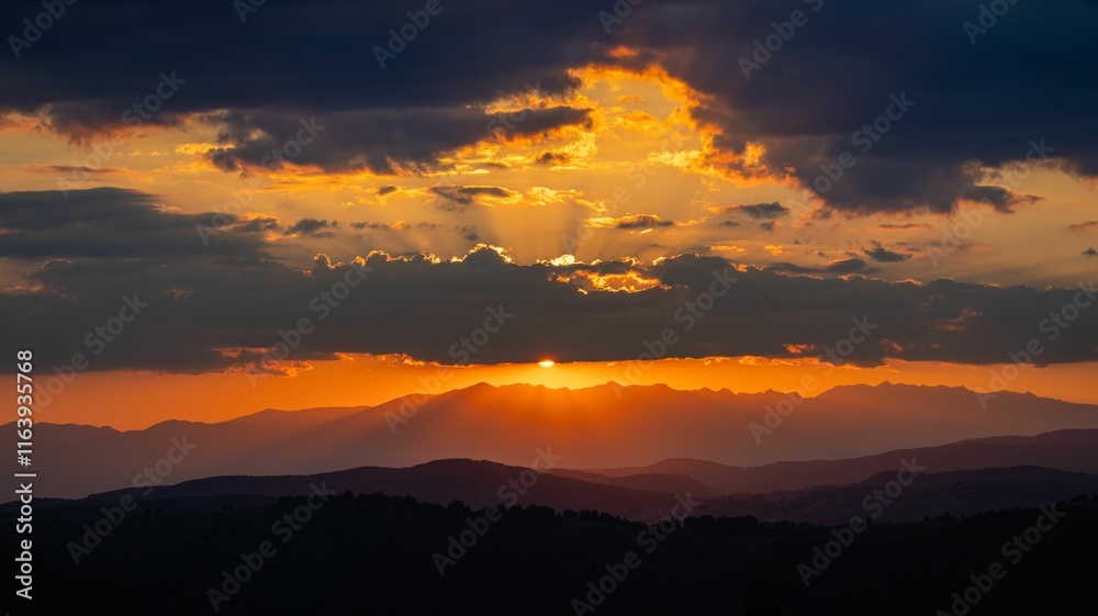 Dramatic sunset over mountain range Dramatic sunset over mountain range