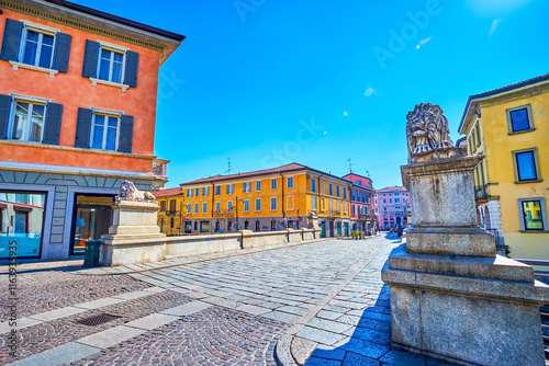 The Bridge of Lions over Lambro river in historical center of Monza town, Italy