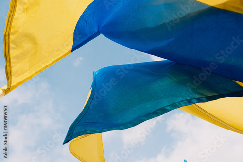 Ukrainian flags at a rally against the war