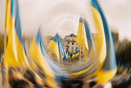 Ukrainian and European Union flags at a rally against the war