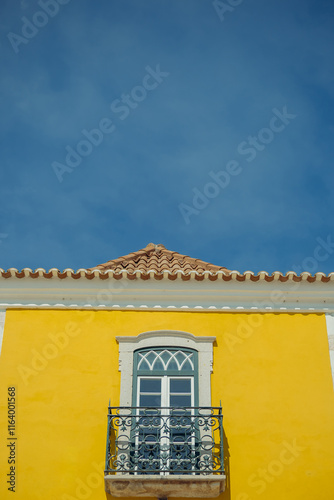orange buildings in old town in portugal. roofs with tiles in Paco de arcos, lisbon district
