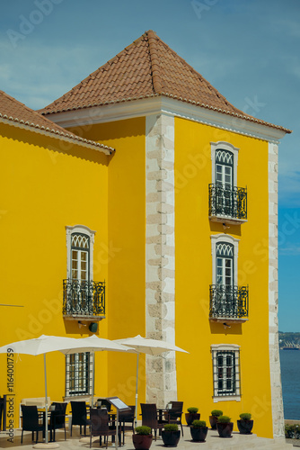 orange buildings in old town in portugal. roofs with tiles in Paco de arcos, lisbon district