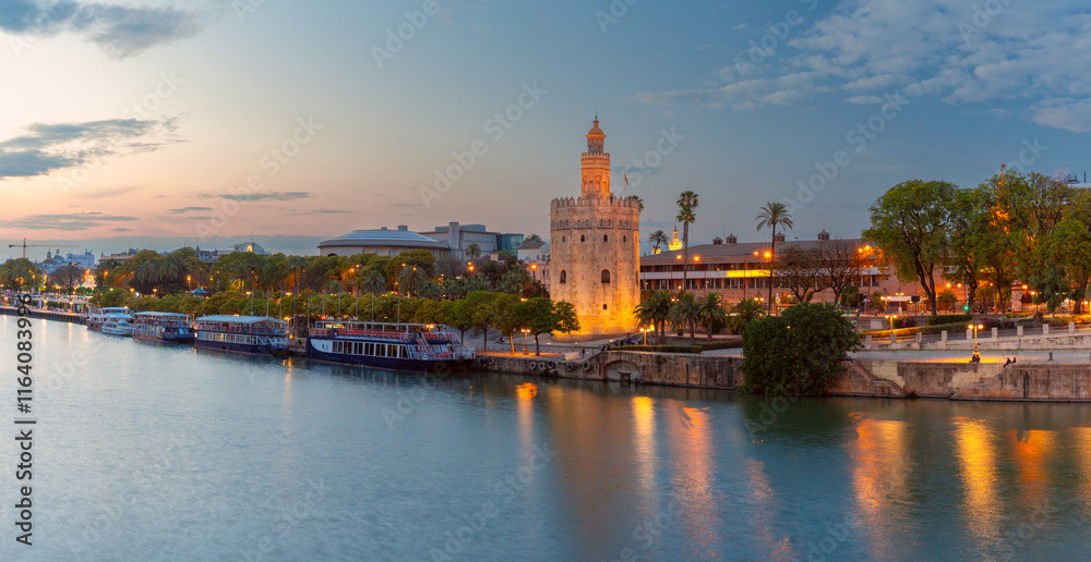 Naklejka premium Scenic view of the Golden Tower in Seville at sunset. Spain. Andalusia.
