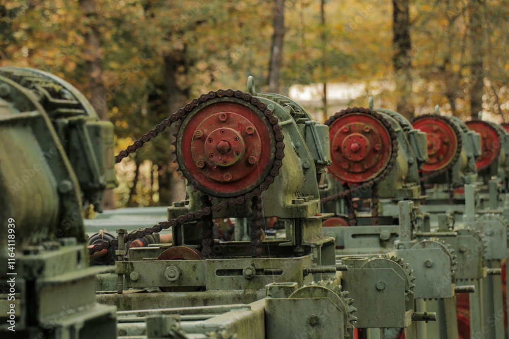 Old rusty machine, abandoned factory construction site. Water research center, weathered scale builds test site in forest, nature. Old rusty machine, abandoned factory construction site. Water research center, weathered scale builds test site in forest, nature.