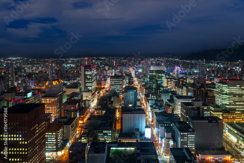 Obraz na płótnie sunset or sun rise of Sapporo cityscape with Skyline and office building and downtown of sappiro is populars ciy from toursim Hokkaido, Japan with twilight sky in spring season w salonie